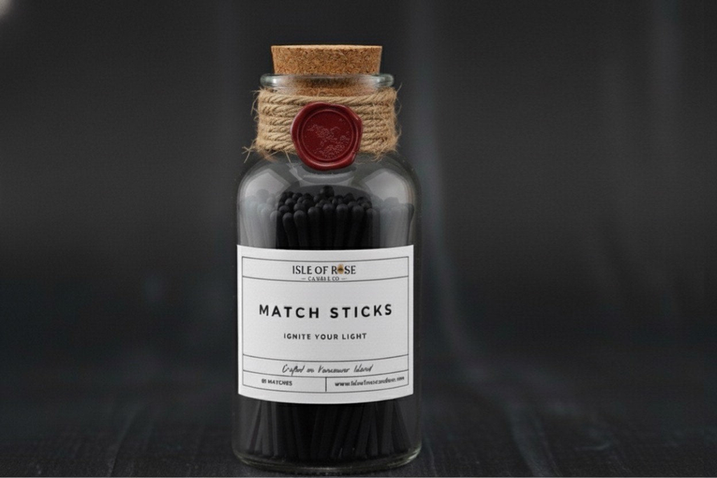 Bottle of matchsticks with a cork lid and label on a dark background
