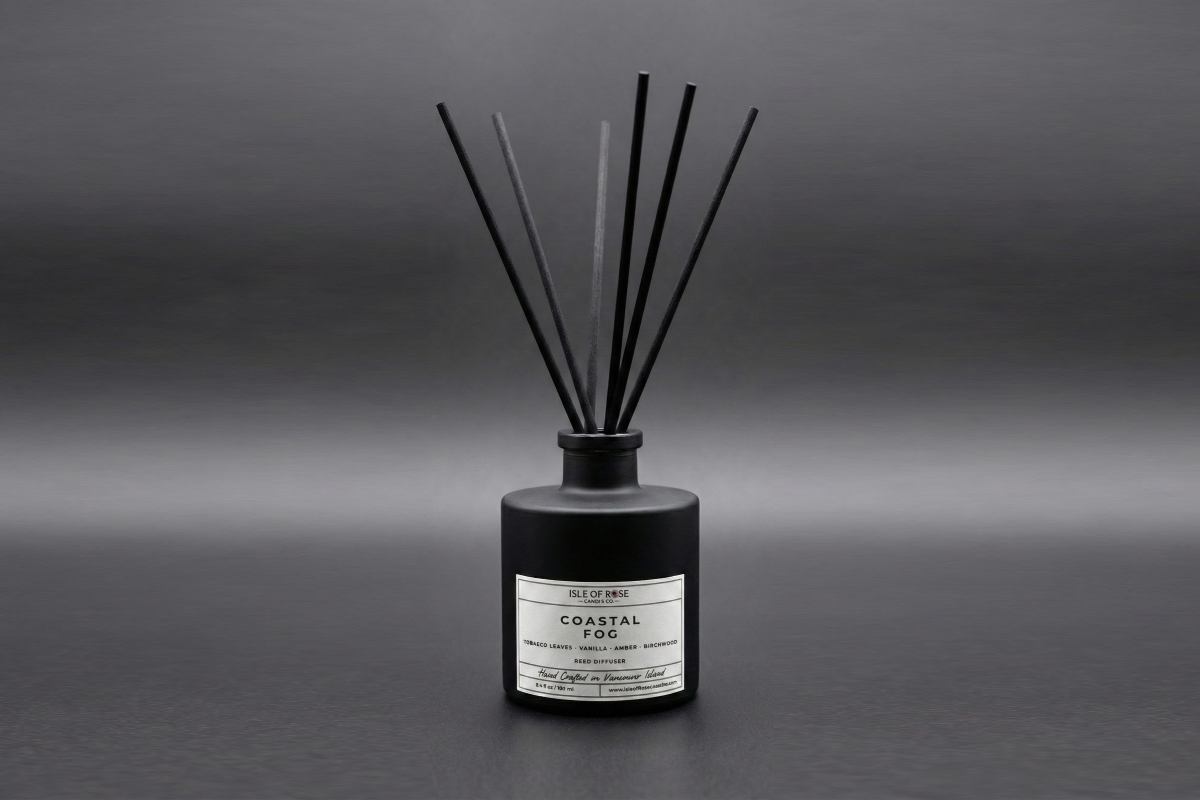 Diffuser with black sticks on a gray background
