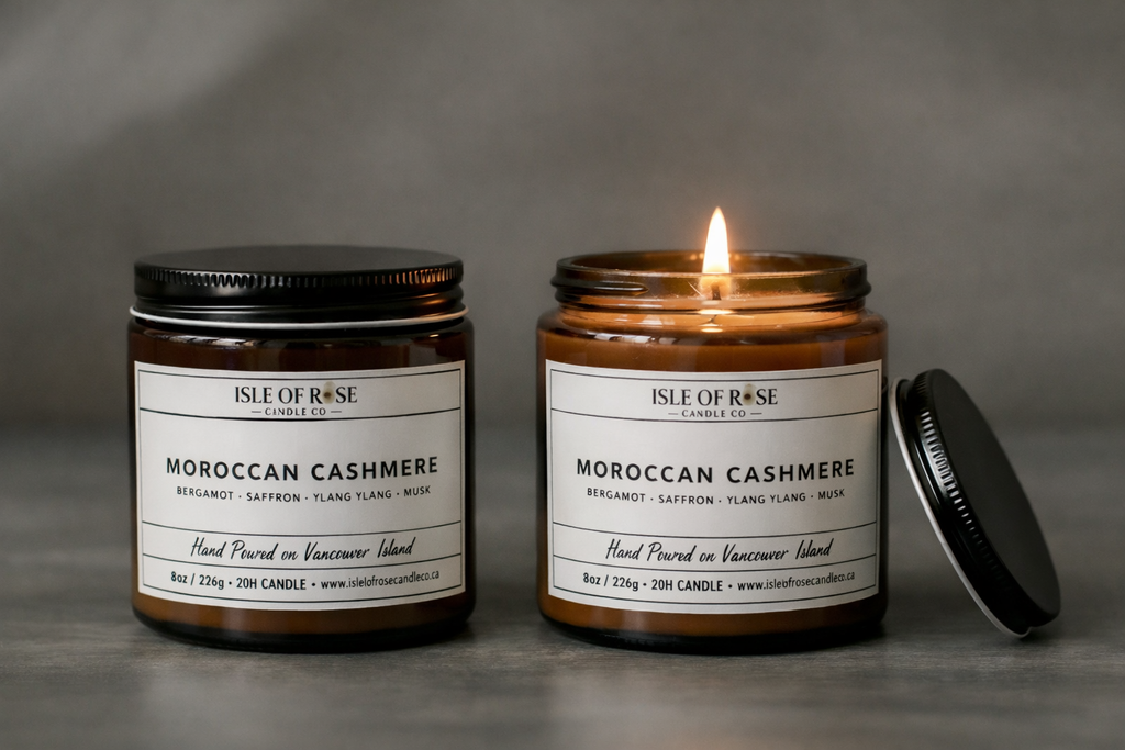Two candles labeled 'Isle of Rose Candle Co. Moroccan Cashmere' on a gray background.