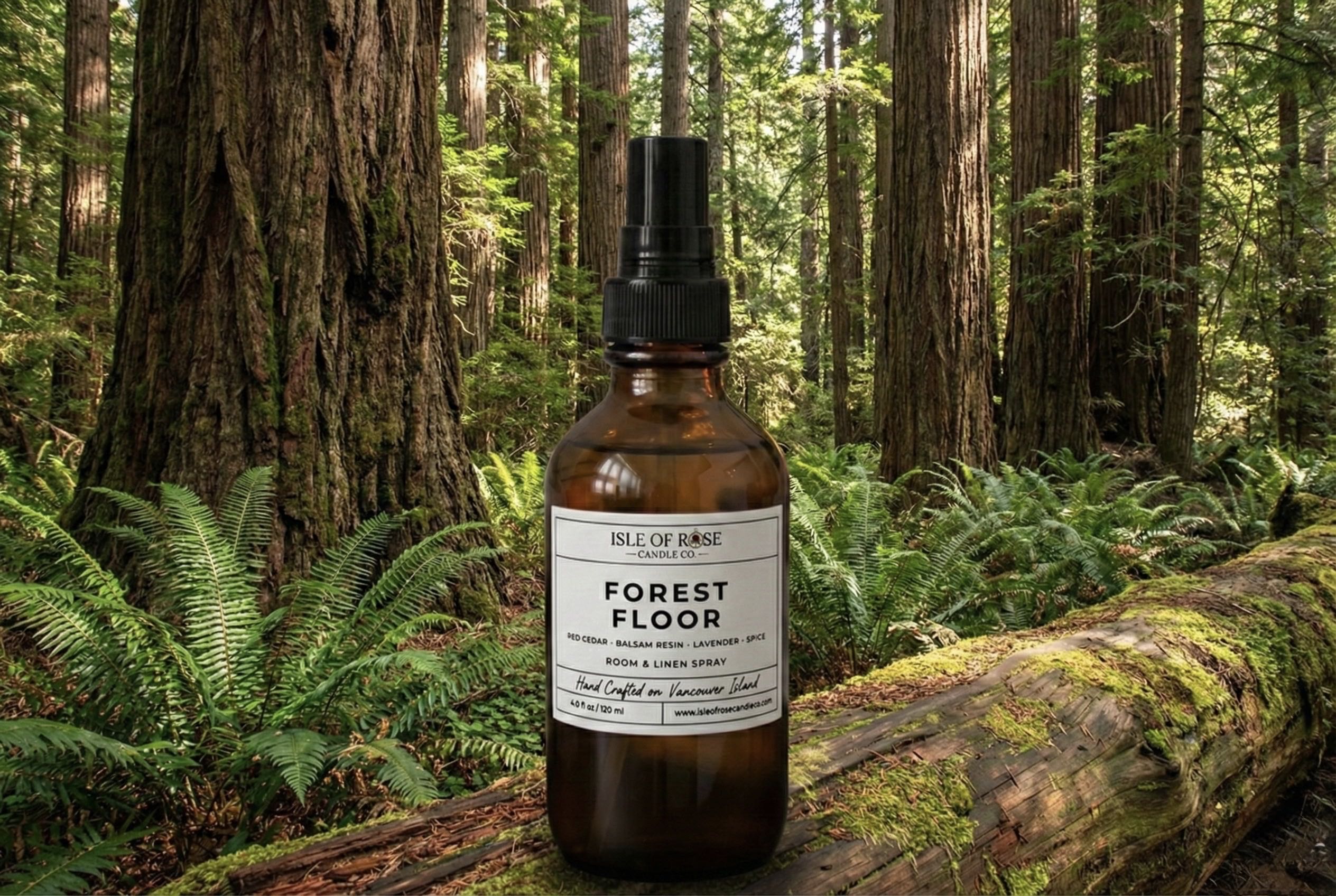 Bottle of 'Forest Floor' cologne by Isle of Rose in a forest setting